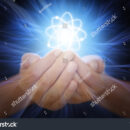 Follow us 1 - stock-photo-hands-with-energy-rays-658121599